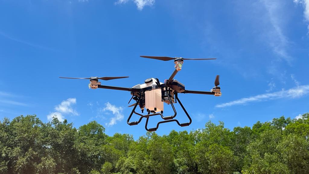 Auraa agri spray drone in flight